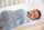Mbështjellëse për bebe Ergobaby Swaddler Stellar, pozicion i shëndetshëm i ijeve, motiv yje dhe hënëza, blu