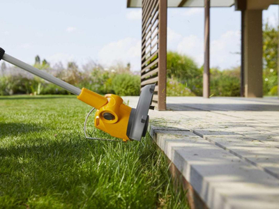 Trimmer bari Stiga GT 100e, 20V, bateri 2.0Ah me karikues, i verdhë