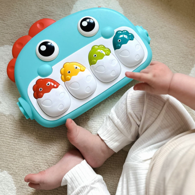 Lodër piano për bebe Woopie Baby Dino, 4 taste, me drita e muzikë, ngjyrë blu