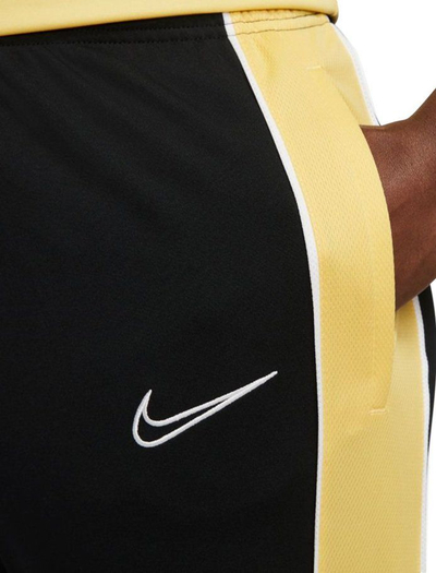 Спортски панталони Nike Dri Fit Academy Track CZ0971, за мажи, тесни, црни со жолта