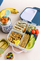 Kuti ushqimi b.box Mini Snack Box, me ndarje, blu jeshile