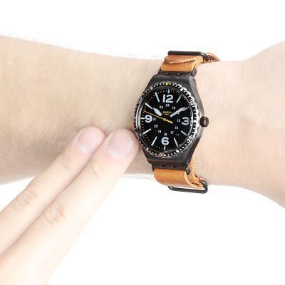 Orë dore Swatch YWB402C