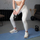 Kettlebell Rebel Active 14 kg, i veshur me PVC, me dorezë të rehathme, gri