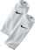 Mansheta për mbrojtëset e futbollit Nike Guard Lock SE0174-103, poliester, teknologji Dri FIT, të bardha