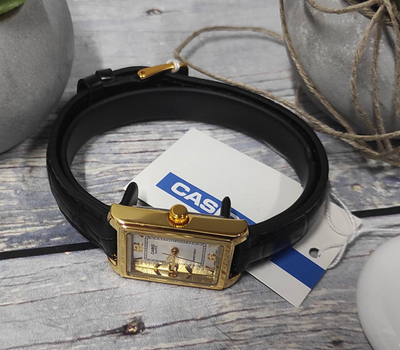 Orë dore Casio LTP-1234PGL-7A2EF, me kuarc, me kornizë ngjyrë ari, me rrip të zi