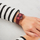 Orë dore Swatch Redbaya GR405