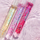 Lip gloss J.Cat Lipspect LLL105 Grape Mind Think Alive, me efekt që i ndërron ngjyra, me vaj argani