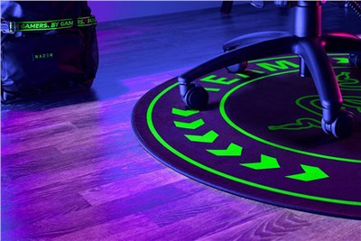 Tapet dyshemeje gaming Razer Team, diametër 120 cm, poliester silikon, i zi e jeshil