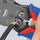 Këmbalidhëse krimpuese Knipex 975112 për RJ10, RJ11, RJ45, me prerëse kabllosh, ngjyrë e zezë