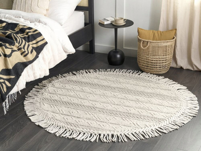 Tapet rrumbullak Beliani BALTALAR, Ø140 cm, lesh me pambuk, ngjyrë krem