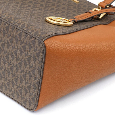 Çantë dore Michael Kors Charlotte Signature 193599717098, e kaftë