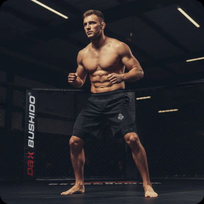 Pantallona të shkurtra MMA DBX Bushido, 2 në 1 me leggins, të zeza