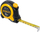 Metër matëse Komelon Self Lock, 5 m x 25 mm, e verdhë