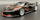 Maket makine Bburago Ferrari FXX K, 1:18, #5, e zezë me portokalli