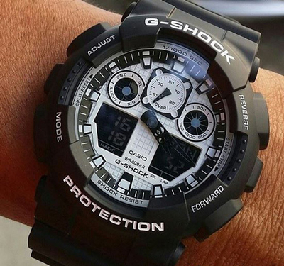 Orë dore Casio G-Shock GA 100BW-1A