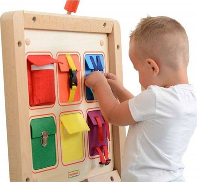 Panel edukativ Masterkidz Pockets, dru 46cm, xhepa me mbyllje, shumëngjyrësh