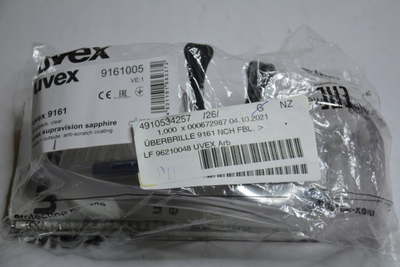 Syze mbrojtëse Uvex 9161.005 Overspecs, lente panoramike, xham transparent