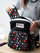 Çantë shkolle BT21 Cool Collection, me xhepa anash, lidhet me trolley, e zezë