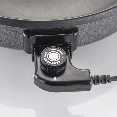 Tigan elektrik Caso Professional Party Pan, 1500W, me kapak qelqi, i zi