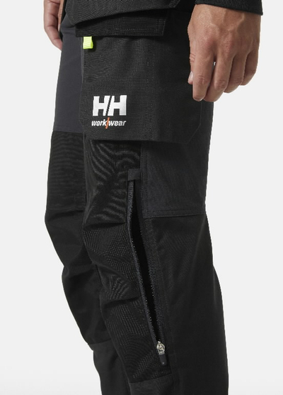 Pantallona pune Helly Hansen Workwear Oxford 4X Cons, me xhepa varese, 4-way stretch, gri e errët me të zezë