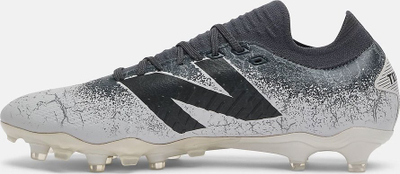 Këpucë futbolli New Balance Tekela V4+ Low Pro FG për terren të thatë, ngjyrë grafit