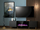 Komodë TV me oxhak elektrik Pafos EF, 180x42x49cm, MDF, e zezë mat