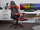 Karrige gaming Beliani VICTORY, lëkurë sintetike, me këmbëz, e kuqe e zezë