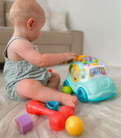 Lodër sorter muzikor Woopie Montessori, formë makine, me çekan dhe blloqe, shumëngjyrëshe