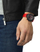 Orë dore për meshkuj Tissot T-Race	T141.417.37.057.01, e kuqe/e zezë