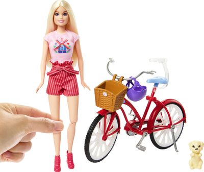 Set lojërash Barbie Pink Passport Holland, kukull me biçikletë, aksesorë udhëtimi, rozë