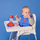 Babator silikon për bebe b.box Superman, xhep i thellë, i kaltër