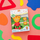 Lodër banjo Glo Pals Daniel Tiger, 2 kube ndriçuese, lojë shqisore, shumëngjyrëshe
