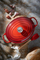 Tenxhere ovale Le Creuset Signature, prej gize, me emalim, e kuqe