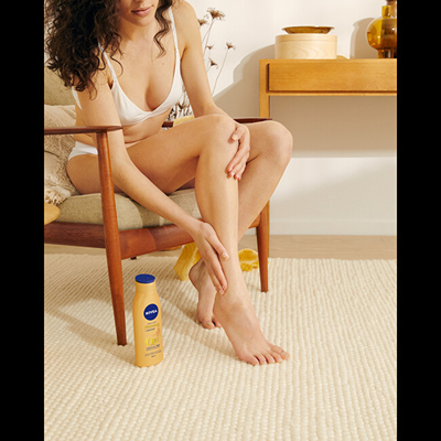NIVEA Q10 Firming + Bronze Лосион за тело, 400 ml