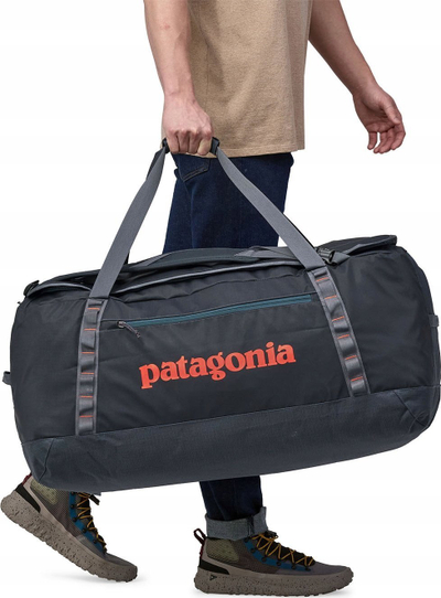 Çantë udhëtimi Patagonia Black Hole Duffel 100L, beze e fortë, me rripa shpine, gri e errët