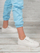 Atlete për femra Levi's Woodward SW 233414-794-50, shollë gome, e bardhë