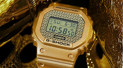 Set orë digjitale Casio G‑SHOCK The Origin DWE-5600HG-1ER (322) + rrip ore, e artë/e zezë/e bardhë
