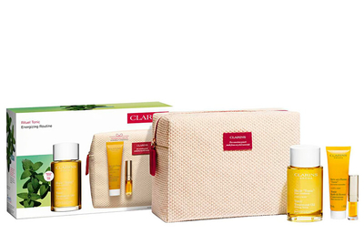 Set Clarins Tonic Ritual, vaj trupi, 100 ml + koncentrat për banjo, 30 ml + vaj për buzë, 1.4 ml + çantë kozmetike