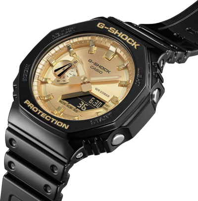 Ora dore Casio G SHOCK GA 2100GB 1AER, rezistente, e zezë