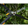 Gërshërë gardhi Fiskars X-Series DualAction SX96, 65cm, doreza FiberComp, portokalli e zezë