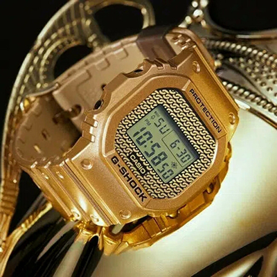 Set orë digjitale Casio G‑SHOCK The Origin DWE-5600HG-1ER (322) + rrip ore, e artë/e zezë/e bardhë