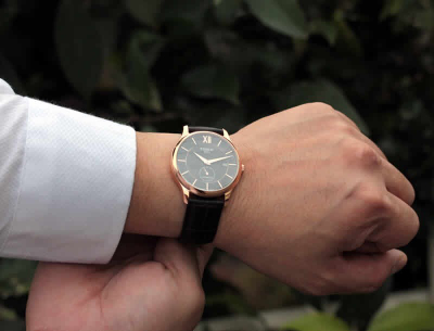 Orë dore për meshkuj Tissot T063.428.36.068.00