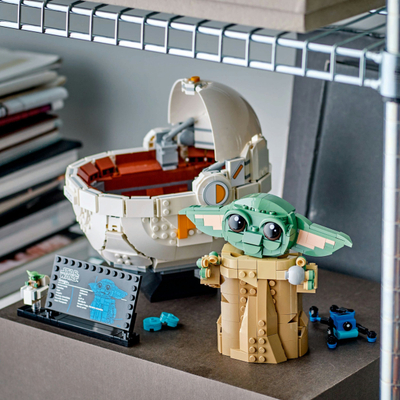 Figurinë dekorative Star Wars Grogu me karrocë lundruese, koleksion Mandalorian, shumëngjyrëshe