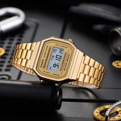 Orë dore Casio Retro me ekran dixhital, alarm, ngjyrë ari