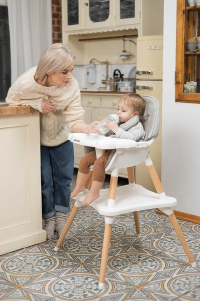 Karrige e naltë për kalamaj Caretero Tuva, bohet set karrige + tavolinë, me tabaka dyshe, rozë