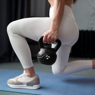 Kettlebell Rebel Active 14 kg, i veshur me PVC, me dorezë të rehathme, gri