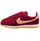Atlete goca Nike Suede W 22071308, material zhapone, të kuqe me bezhë